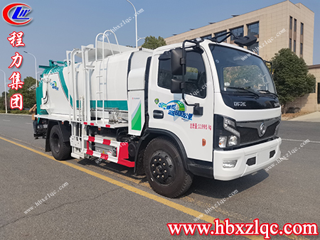 處理食物殘?jiān)易钤谛?，新能源油電混合餐廚垃圾車實(shí)現(xiàn)健康生活每一天